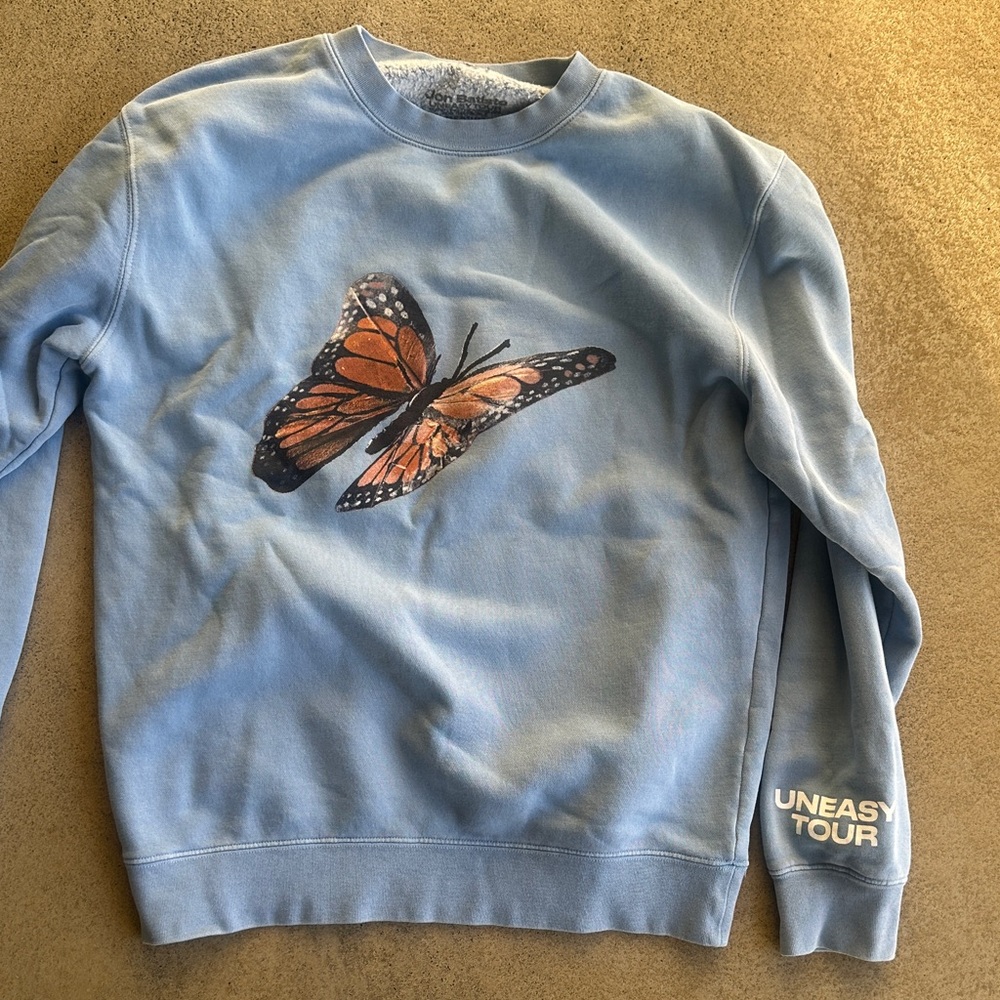 Blue Sweatshirt with Butterfly Design from Jon Batiste Concert